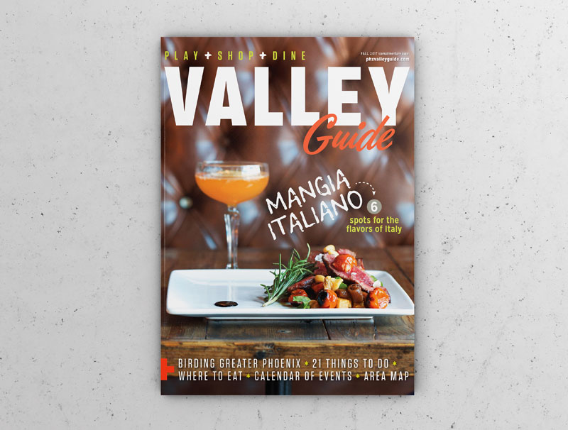 The cover of Valley Guide Magazine featuring a stylish Italian dish with a cocktail in a restaurant setting