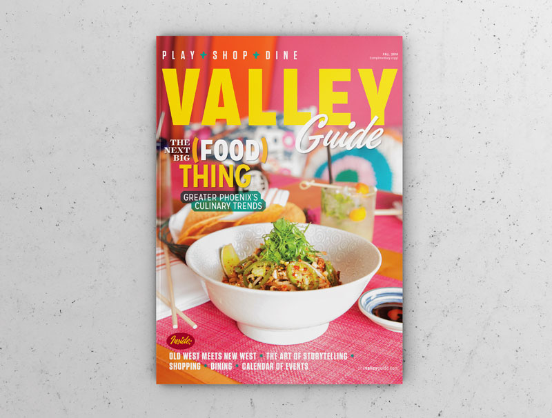 The cover of Valley Guide Magazine featuring a poke bowl in a colorful setting